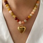 Ladies fashion pendant necklace, multi-tonal natural stone mixed beads, niche titanium steel heart charm design.