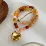 Ladies fashion pendant necklace, multi-tonal natural stone mixed beads, niche titanium steel heart charm design. - Image 3