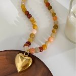Ladies fashion pendant necklace, multi-tonal natural stone mixed beads, niche titanium steel heart charm design. - Image 4